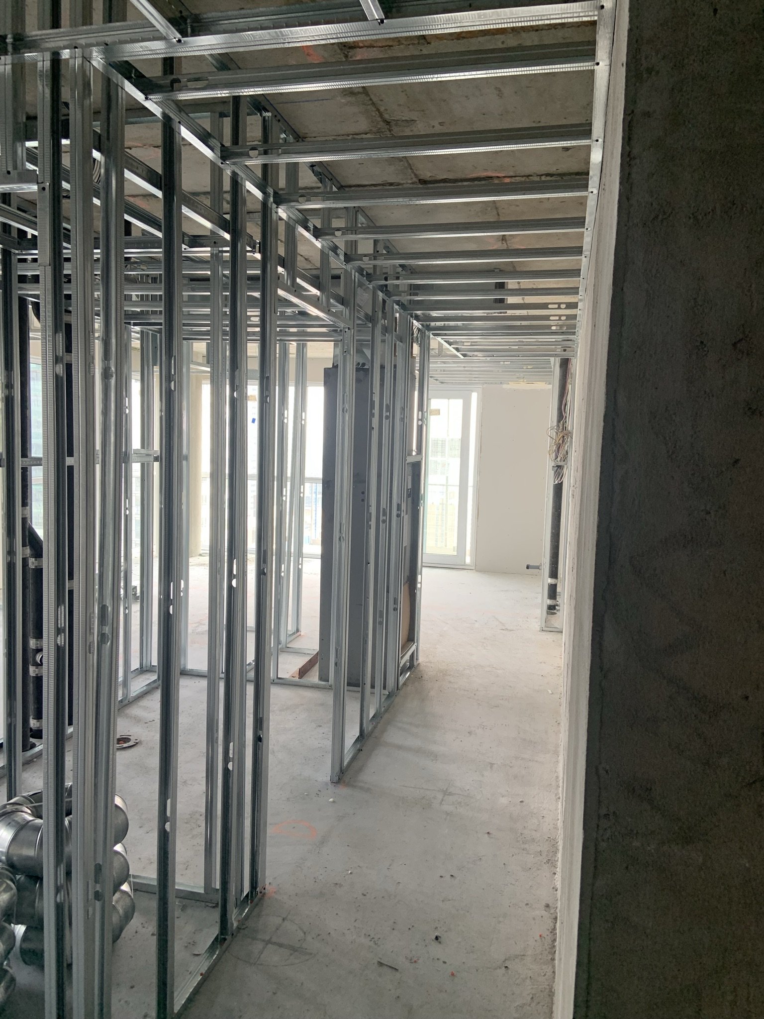 Residential condo renovation featuring metal stud framing installation in Mississauga.