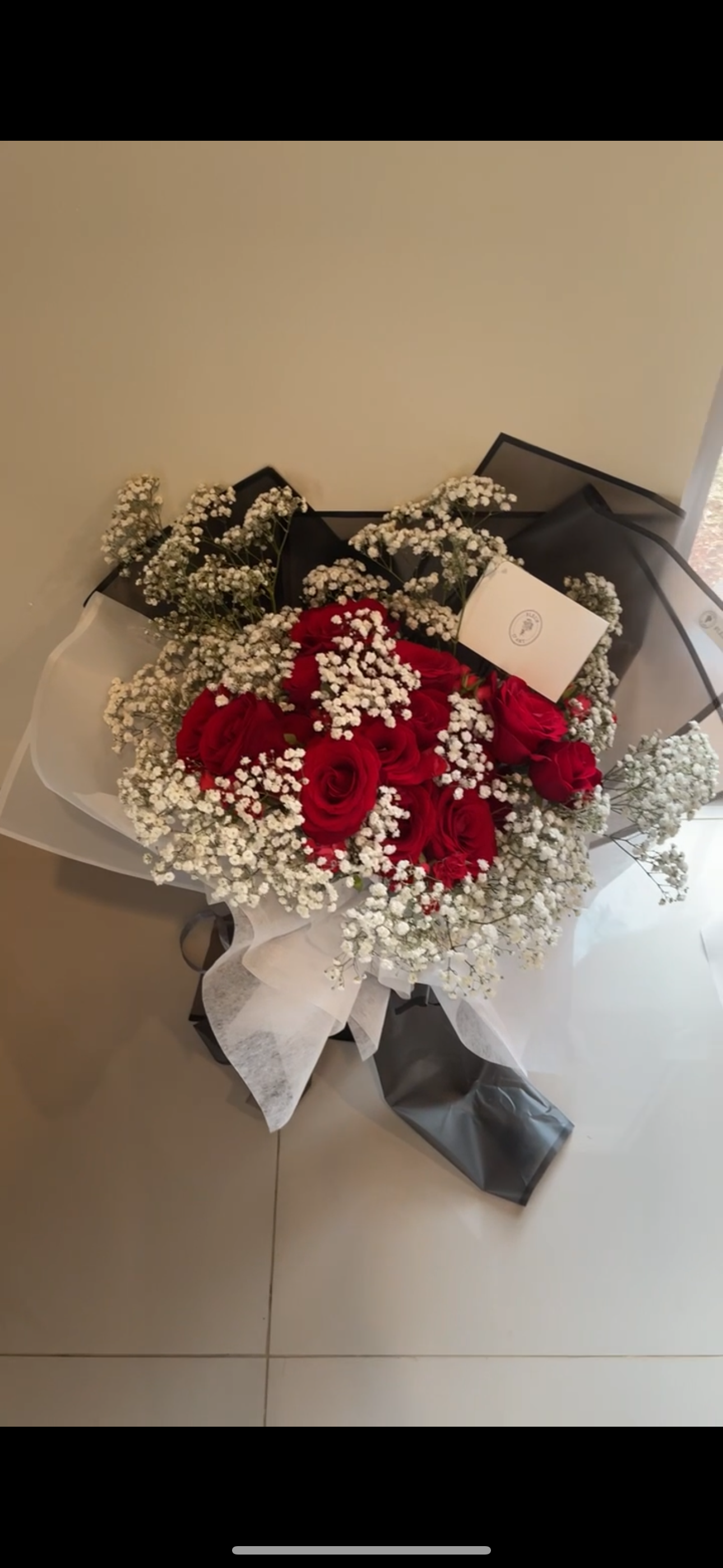Red Roses Drowned in Baby Breath