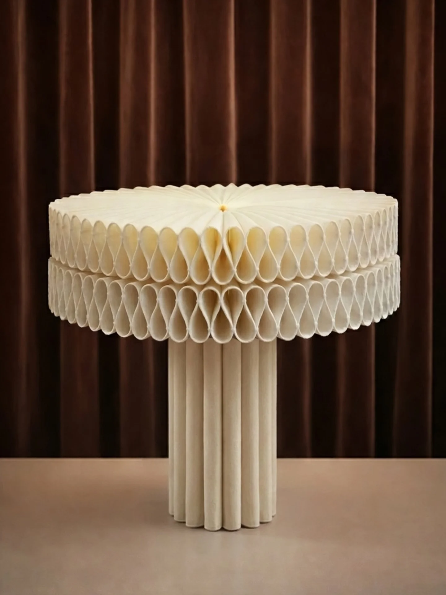 Ruff Table Lamp By Josh Jen

This lamp is inspired by the Elizabethan ruff, a pleated collar worn in the late 16th and early 17th centuries across England and parts of Europe, particularly in Spain, France, and the Netherlands. It was often associate