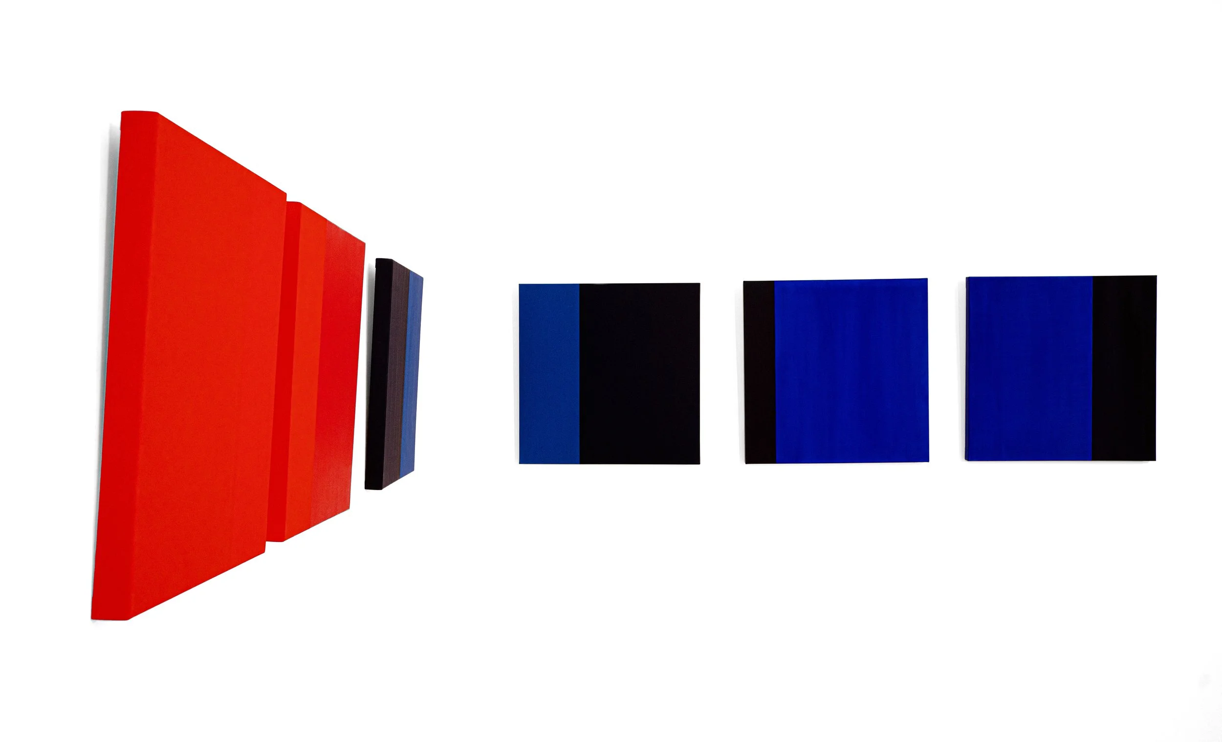 A row of colored rectangular panels, from red to black and blue, arranged on a white background.