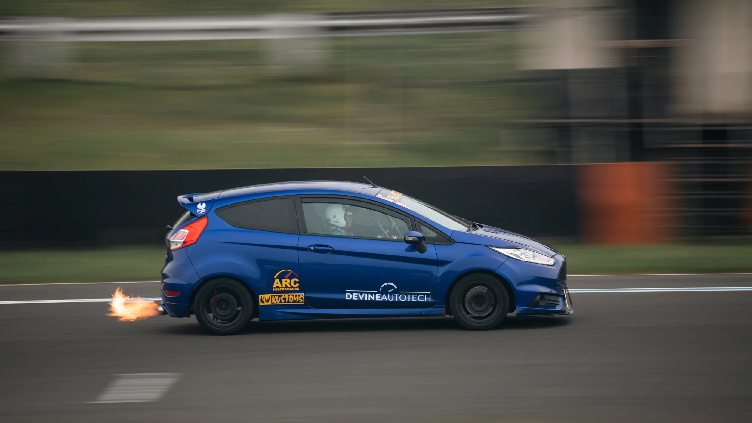 Ford Fiesta with flames coming out of the exhaust at knockhill