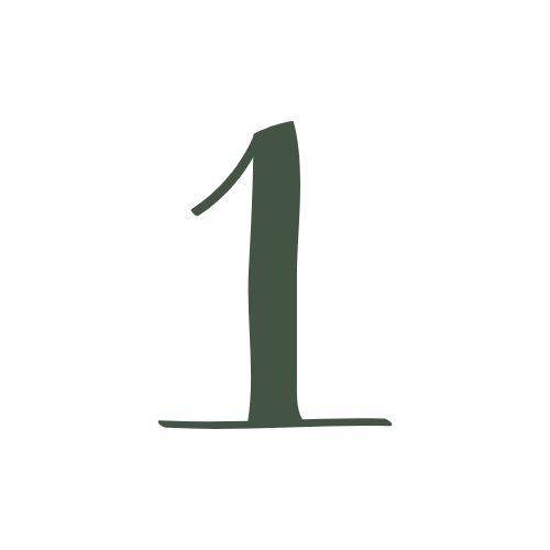 A large black chalkboard with a white number one written in the center.