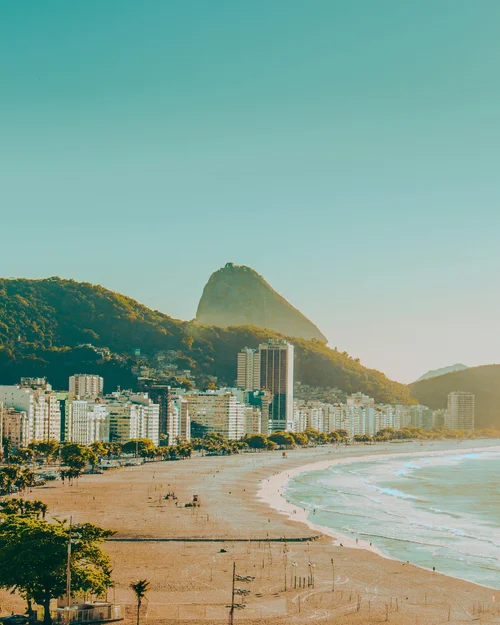 City street at sunset with skyscraper