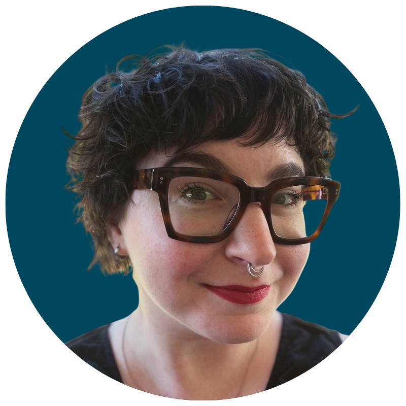 A photo of Katie Frank, growth marketer, wearing glasses