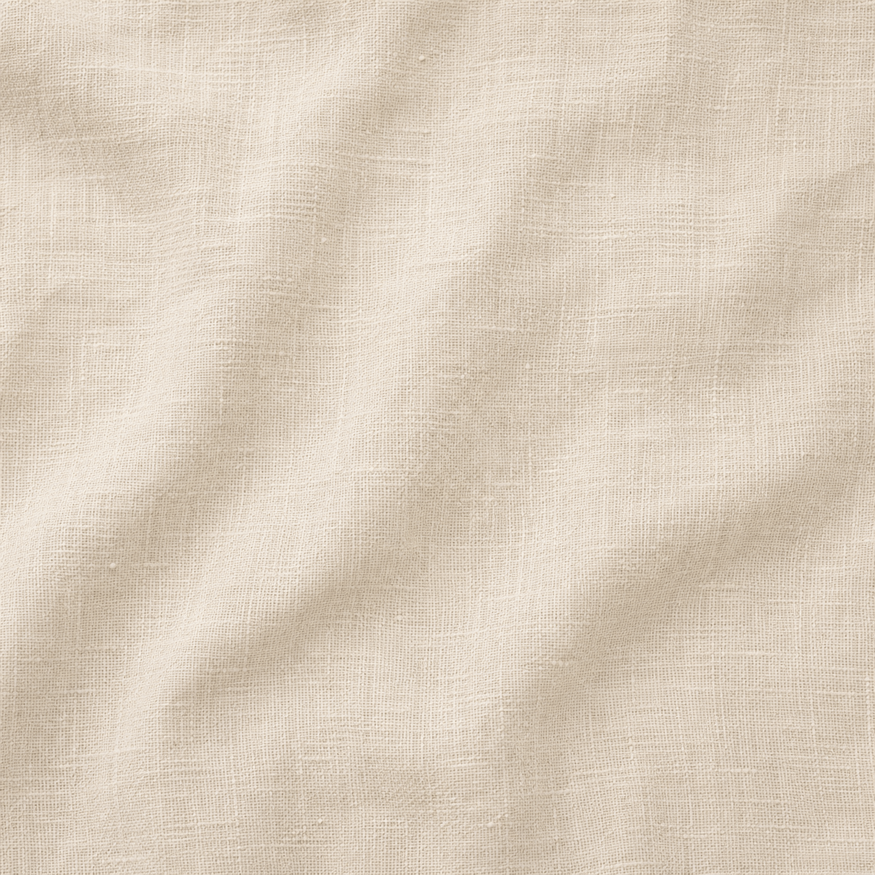Close-up of beige fabric with a textured, woven appearance and gentle folds.