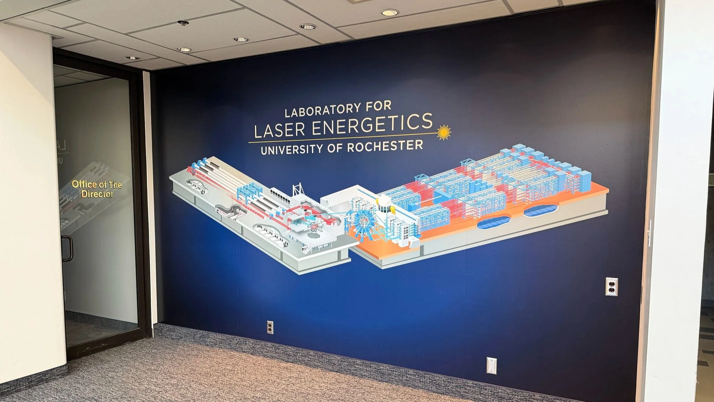 Created a custom illustration of LLE’s two major laser systems and designed this large-scale environmental graphic for the facility entrance. Managed vendor sourcing and installation of the piece, which is now used regularly during laboratory tours a