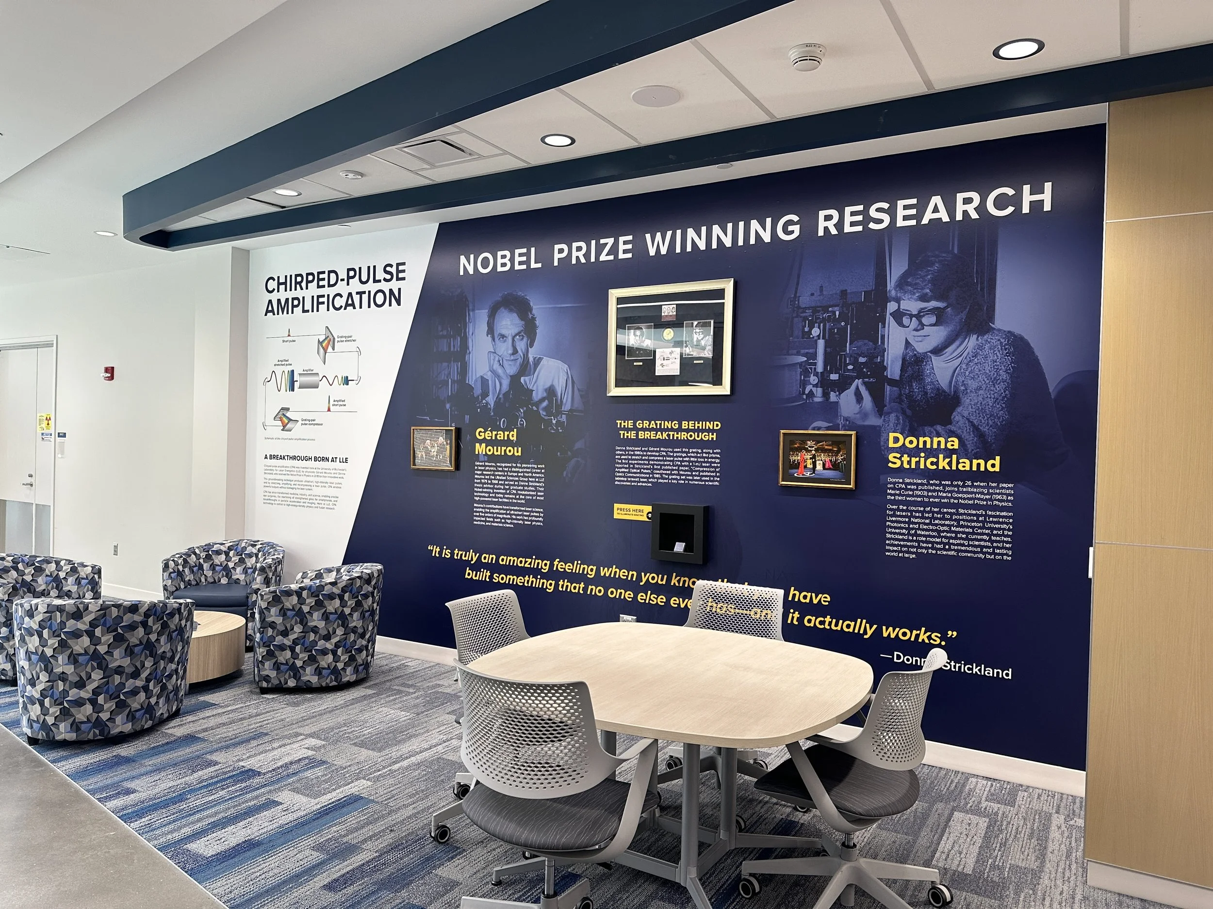 Led the art direction and execution of this permanent installation honoring LLE’s Nobel Prize-winning physicists. Collaborated with my team to develop the concept, coordinate vendors, and oversee fabrication and installation, including a custom illum