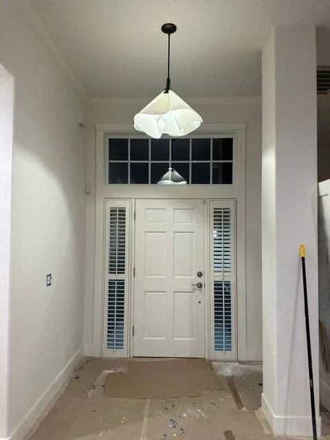 Modern entryway pendant chandelier lighting a Beaverton home remodel
