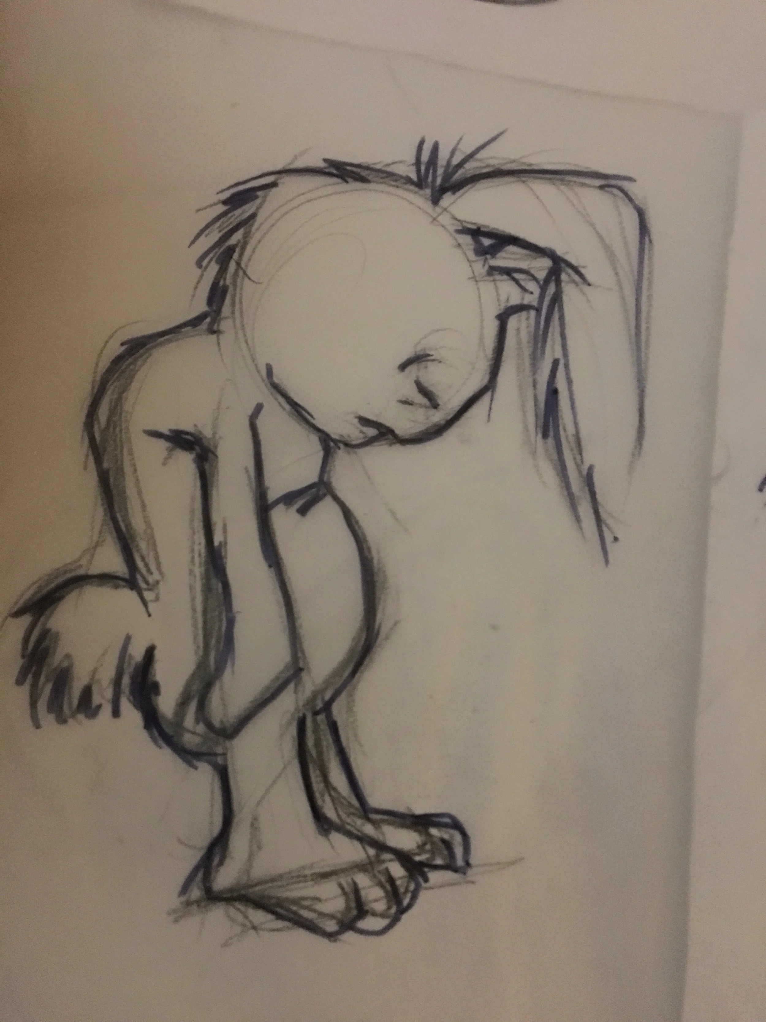 Sketch of a woman with long hair, leaning forward.