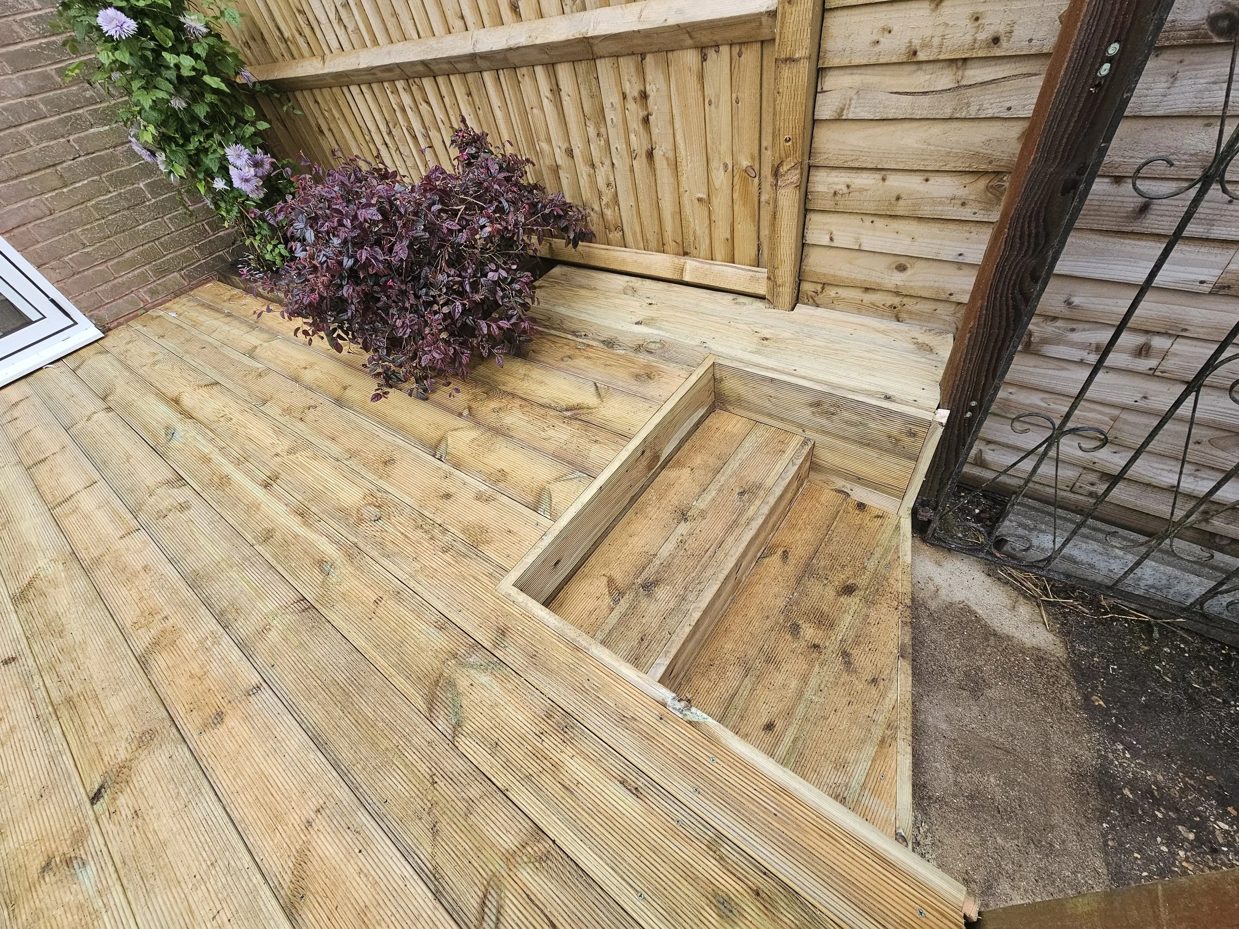 Newly installed wooden deck with stairs