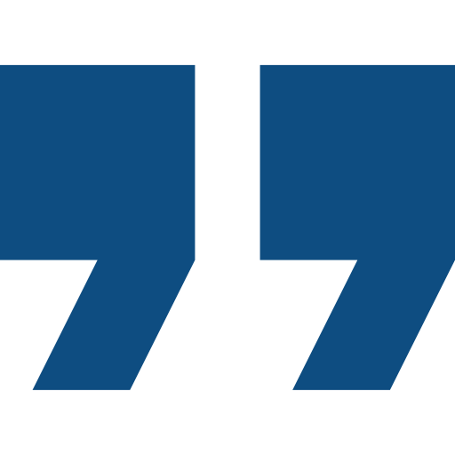 Two large blue quotation marks on a black background.