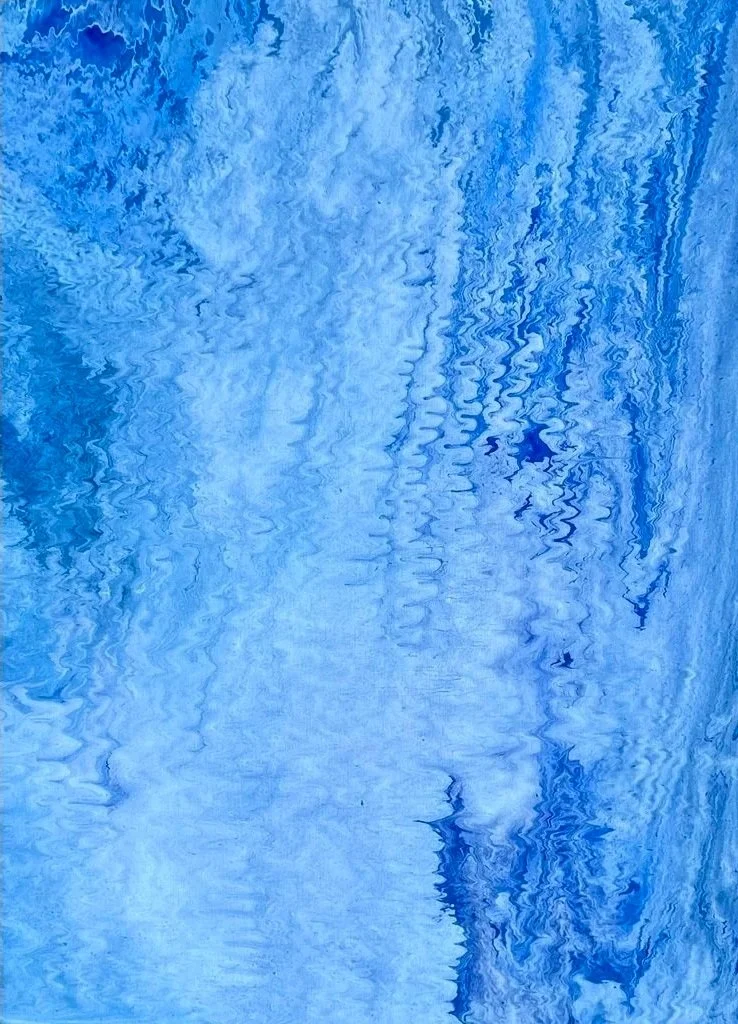Abstract pattern with various shades of blue, resembling rippling water or sky reflections.
