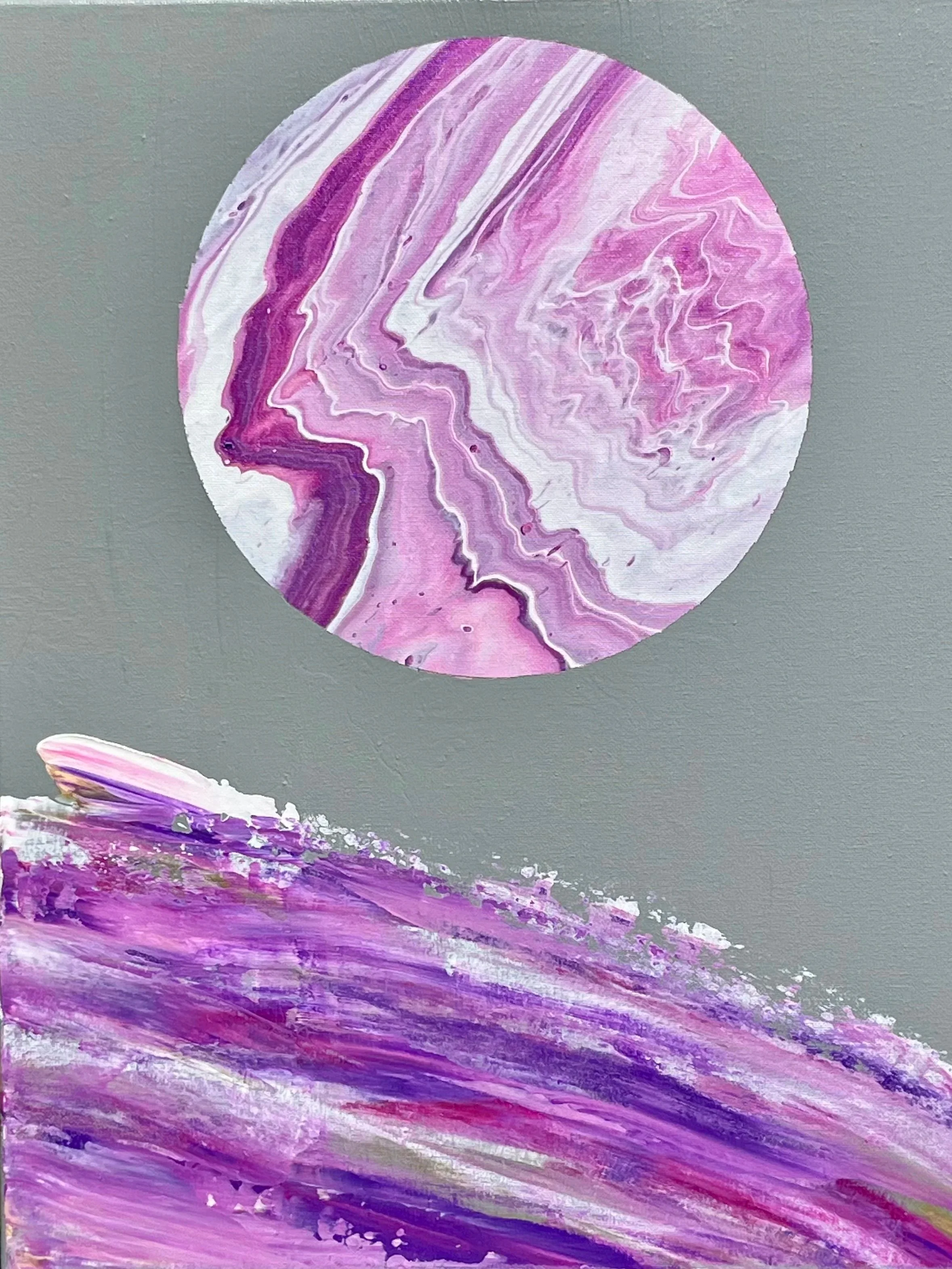 Abstract artwork featuring a circular shape with swirling patterns in various shades of pink, purple, white, and hints of green and gold, on a gray background.