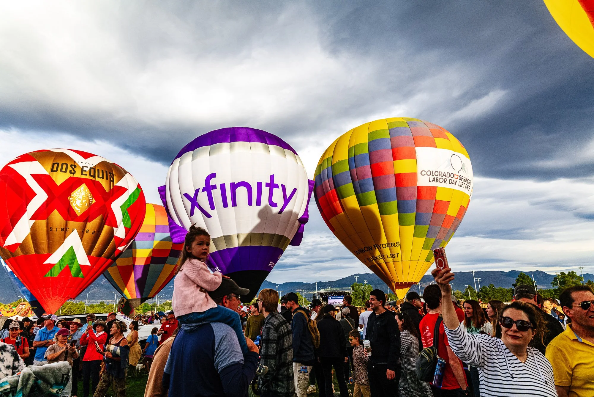 Crowds watching balloons launch during Labor Day Lift Off 2026