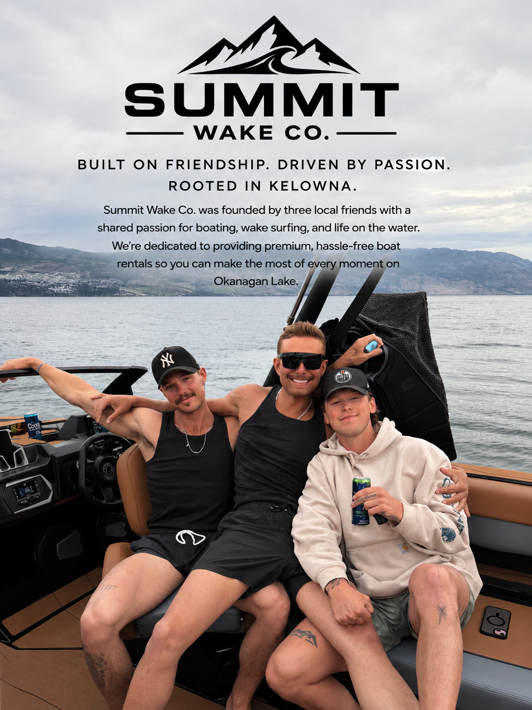 Three young men relaxing on a boat on Okanagan Lake, with mountains in the background, promoting Summit Wake Co. in Kelowna.
