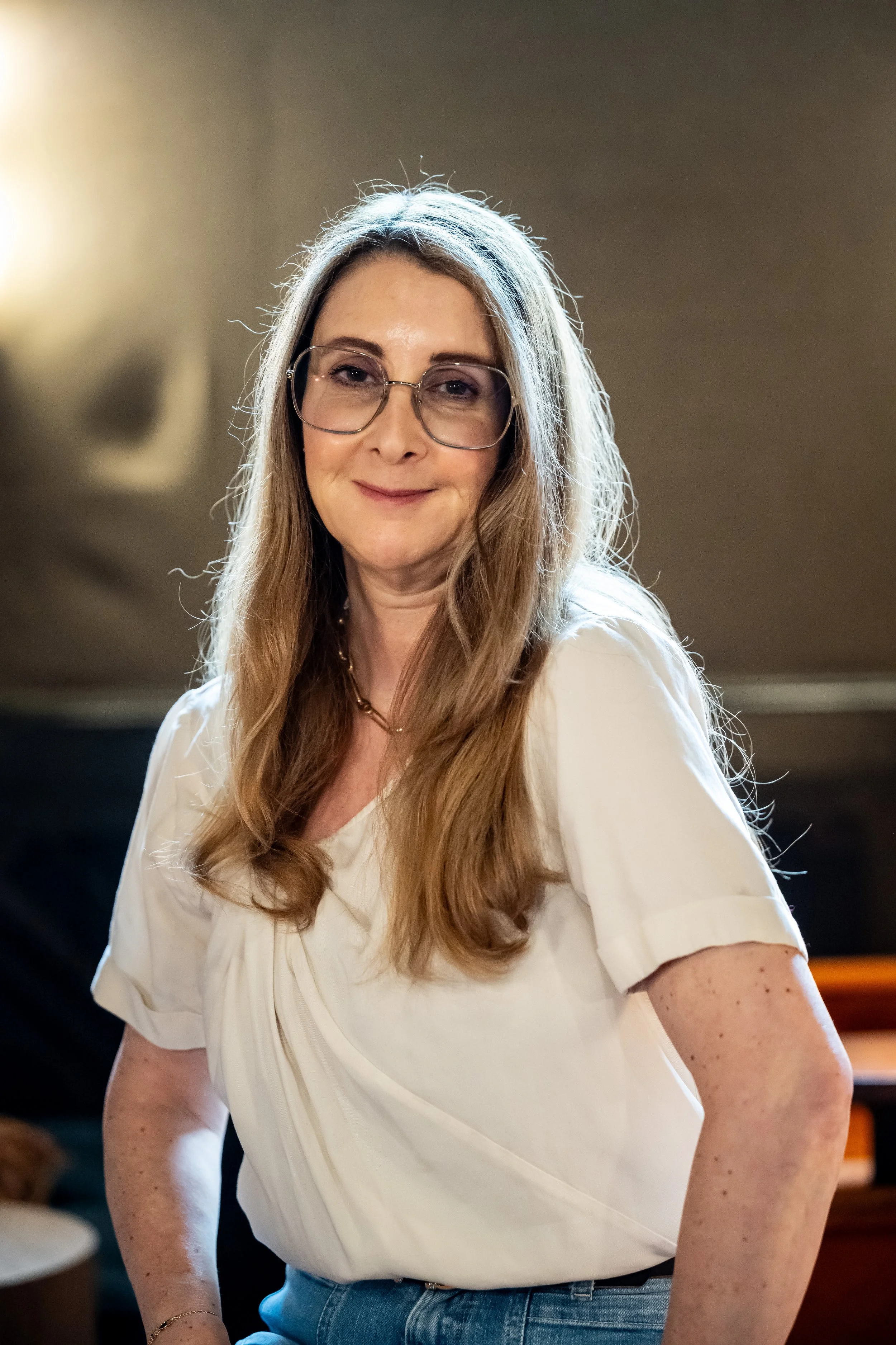 Portrait of personal stylist Sam Remer, founder of I Love Jeans, specialising in denim-first styling for women over 40.