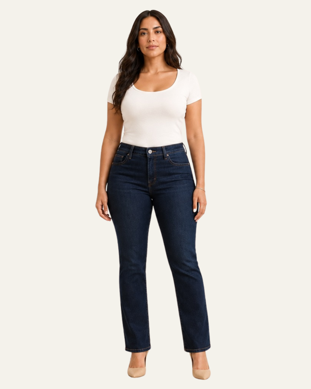 Woman with a curvy body shape wearing dark blue straight-leg jeans and a white top.