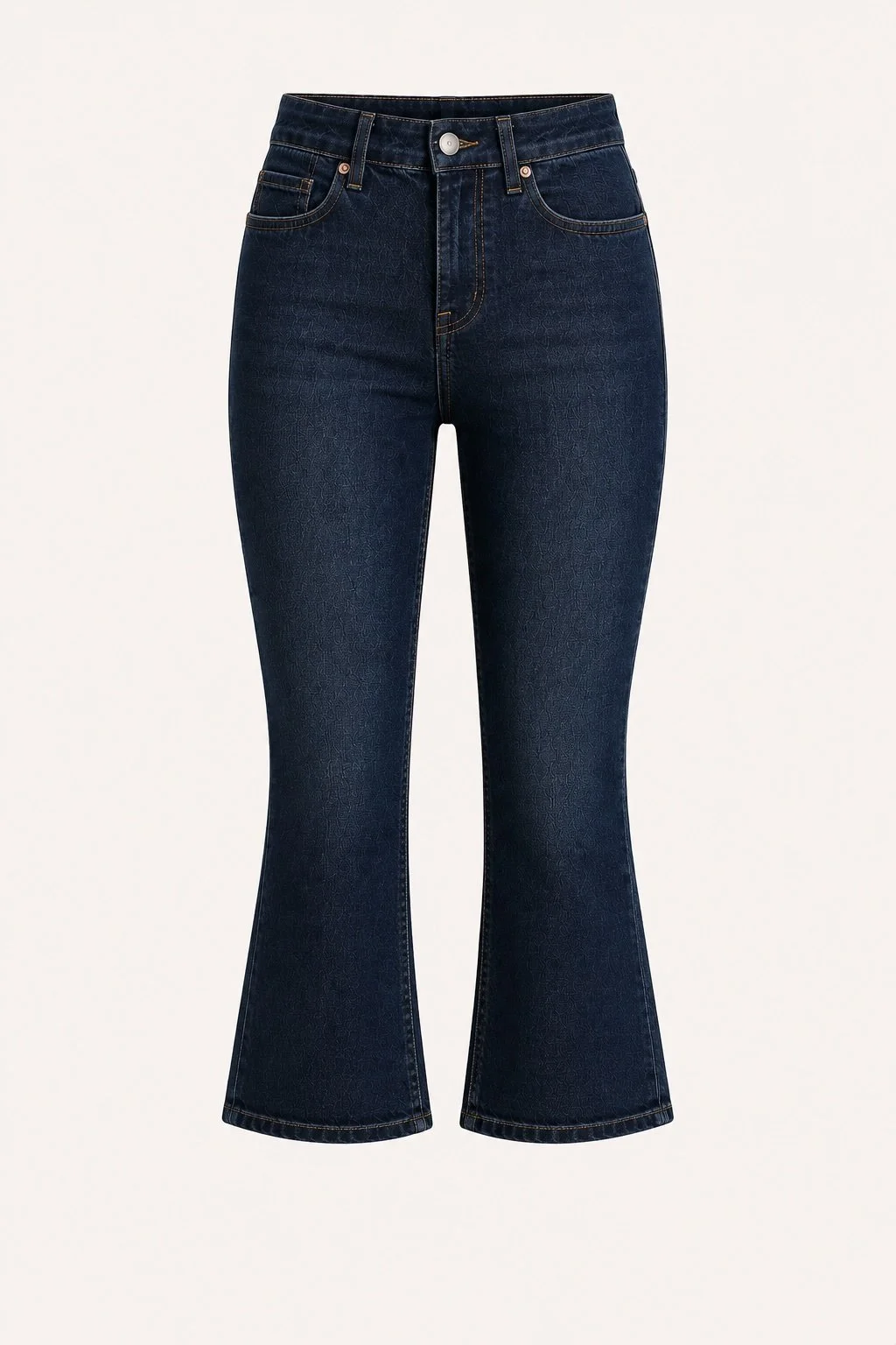 Pair of dark wash cropped flare jeans against a plain background.