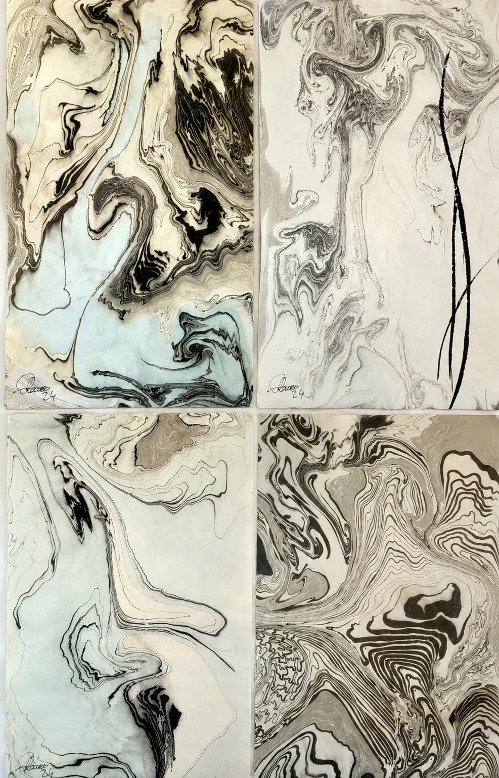 Four abstract marbled artworks arranged in a 2x2 grid, featuring swirling black, gray, beige, and white patterns.