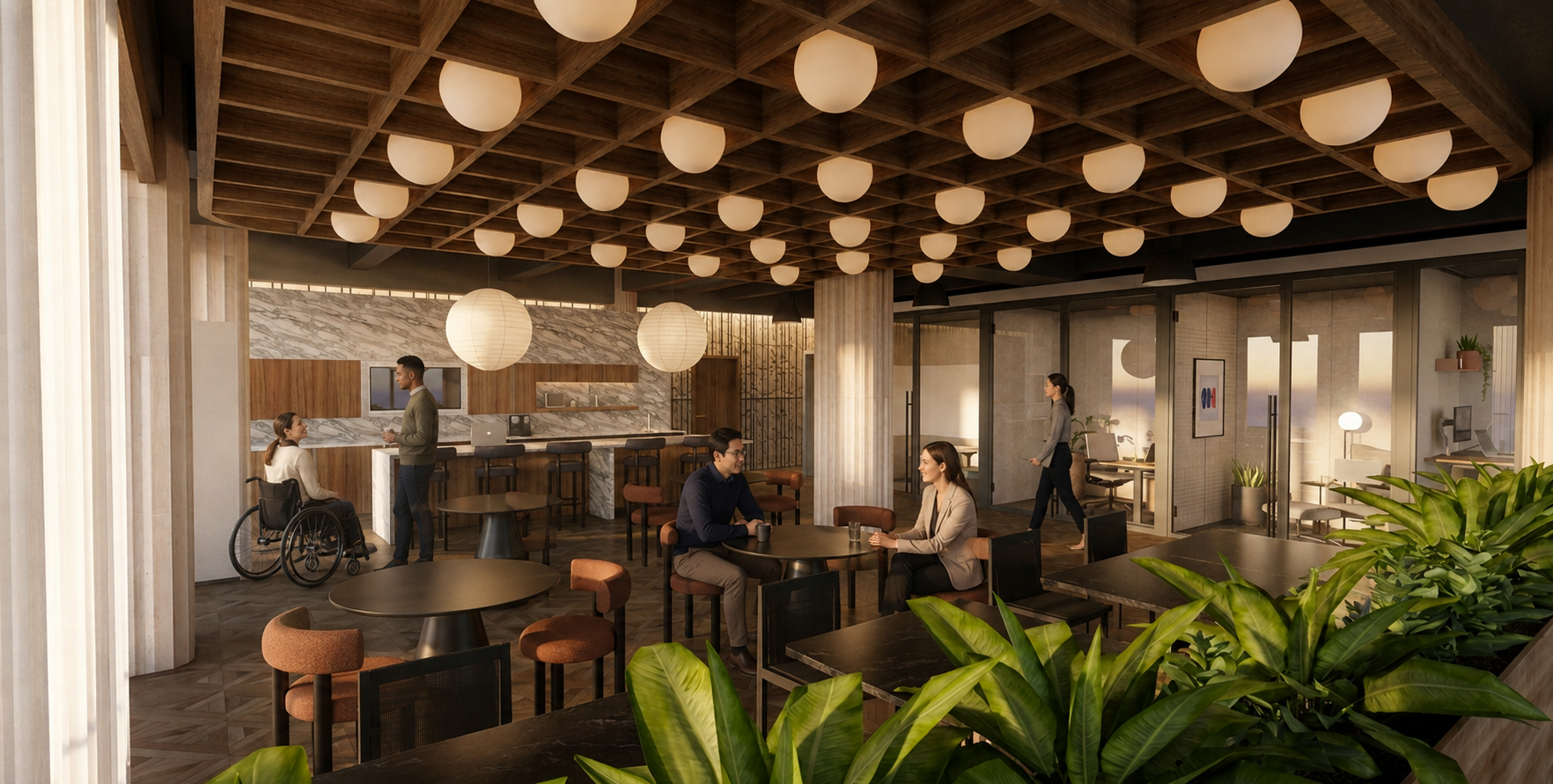 Work Café: The Work Café creates a flexible social and collaborative hub with varied seating, integrated biophilia, and an accessible counter supporting an inclusive workplace experience.