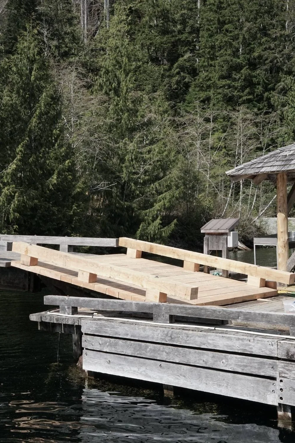 remote ocean ramp dock rebuild timber clayoquot lodge bc front desk commercial remote project construction MTN Side general contractor