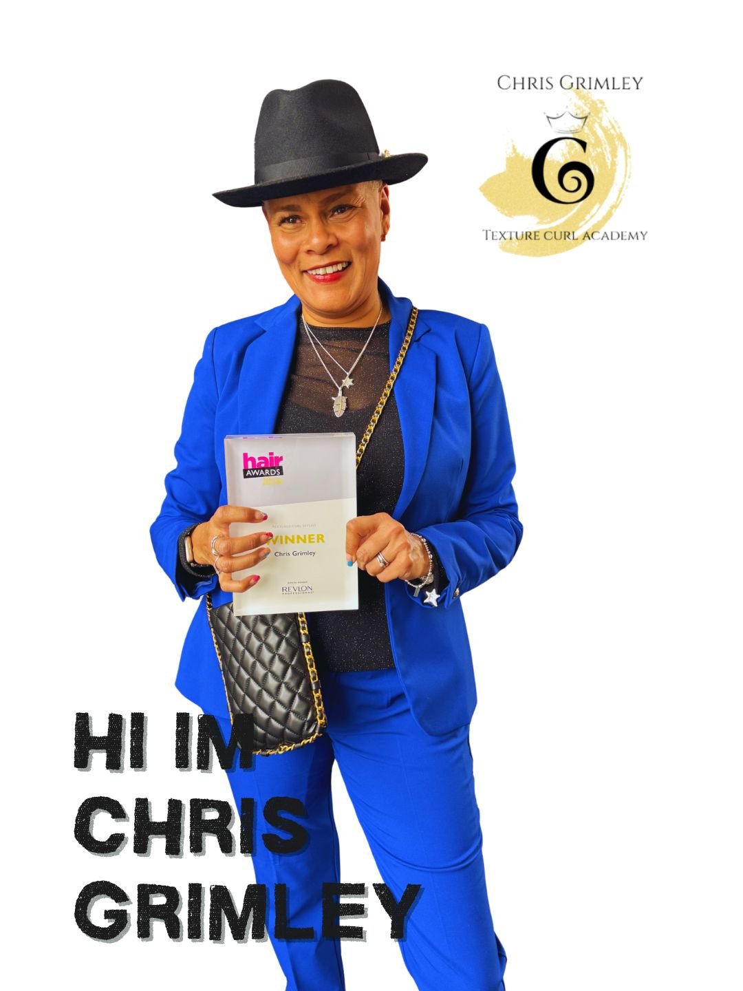 A woman in a blue suit holding an award plaque with the text 'WINNER Chris Grimley' at the Hair Awards. She is smiling, wearing a black hat, silver jewelry, and a quilted black purse with a gold chain. There is a logo for 'Texture Curl Academy' in the upper right corner and the text 'HI I'M CHRIS GRIMLEY' in bold black letters at the bottom.