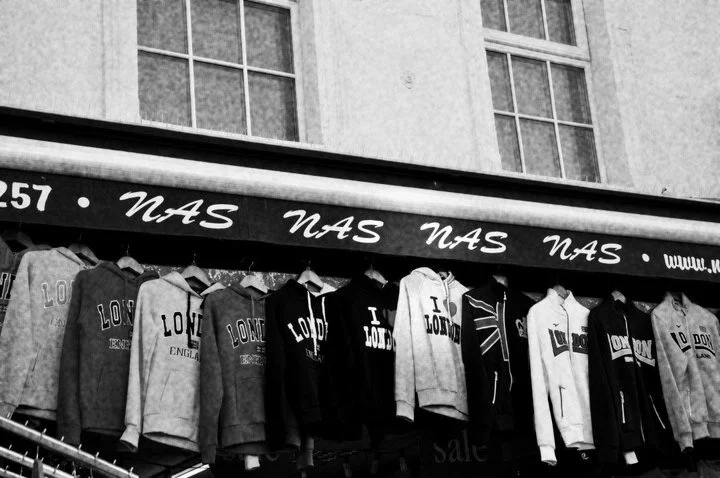 Row of hoodies and sweatshirts with
