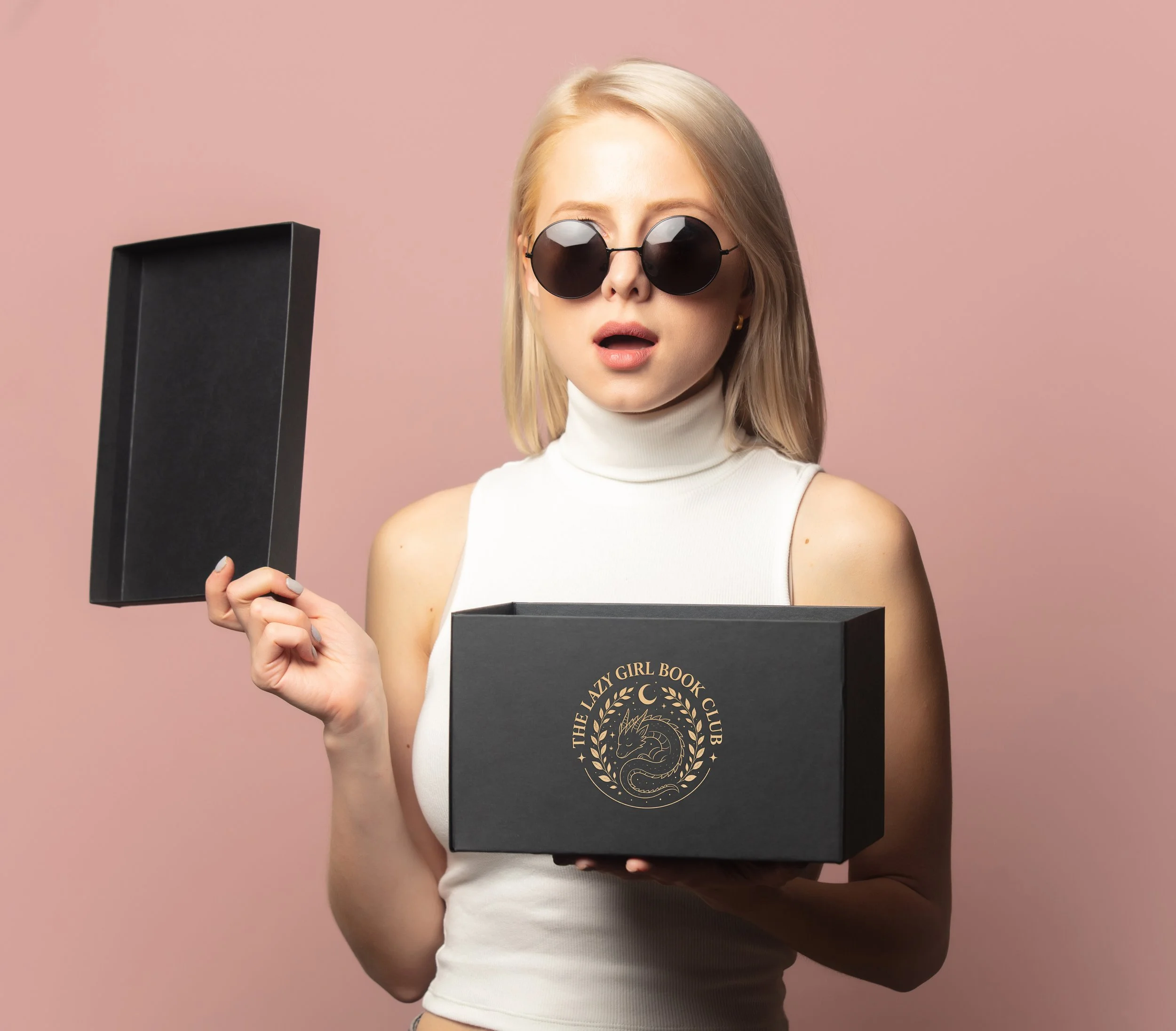woman-holds-open-black-box-with-surprised-expressi-2026-03-09-07-13-02-utc copy.jpg