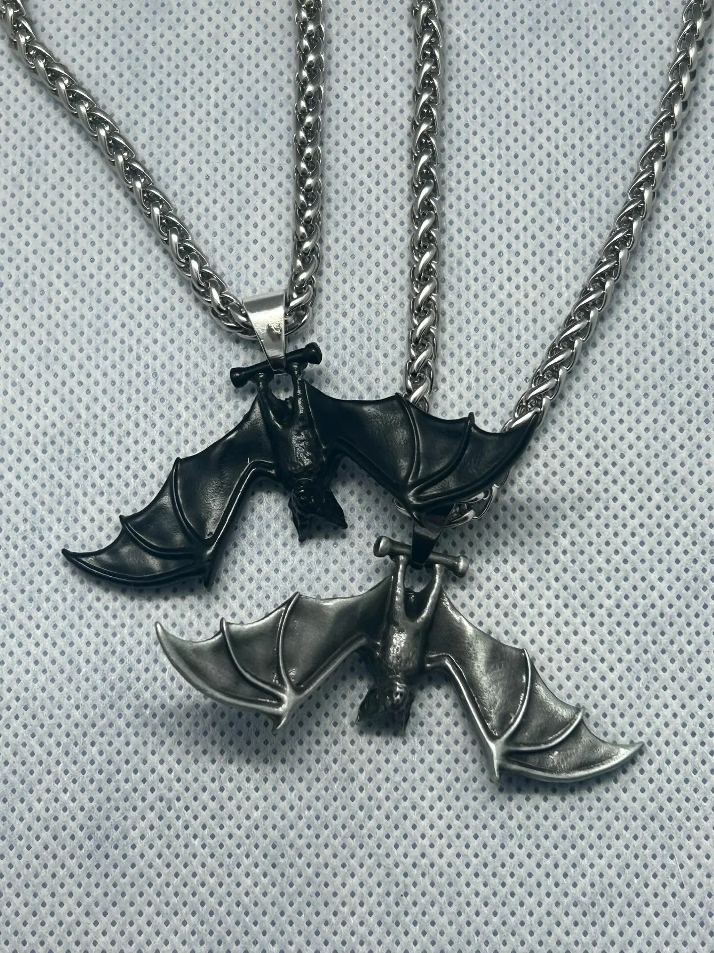 Hanging Bat Pendant by ZILOS 

The perfect gift for any holiday or birthday!

This 2.4 x 1 inch pendant was made in mind of my love for bats and lightweight jewelry. One of my first of many origional designs, I sketched this one out last year and fin