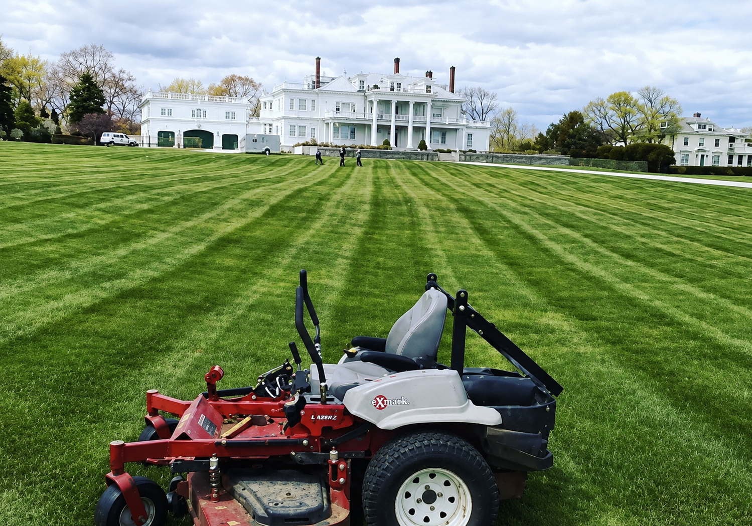 Commercial lawn maintenance at a large coastal property.