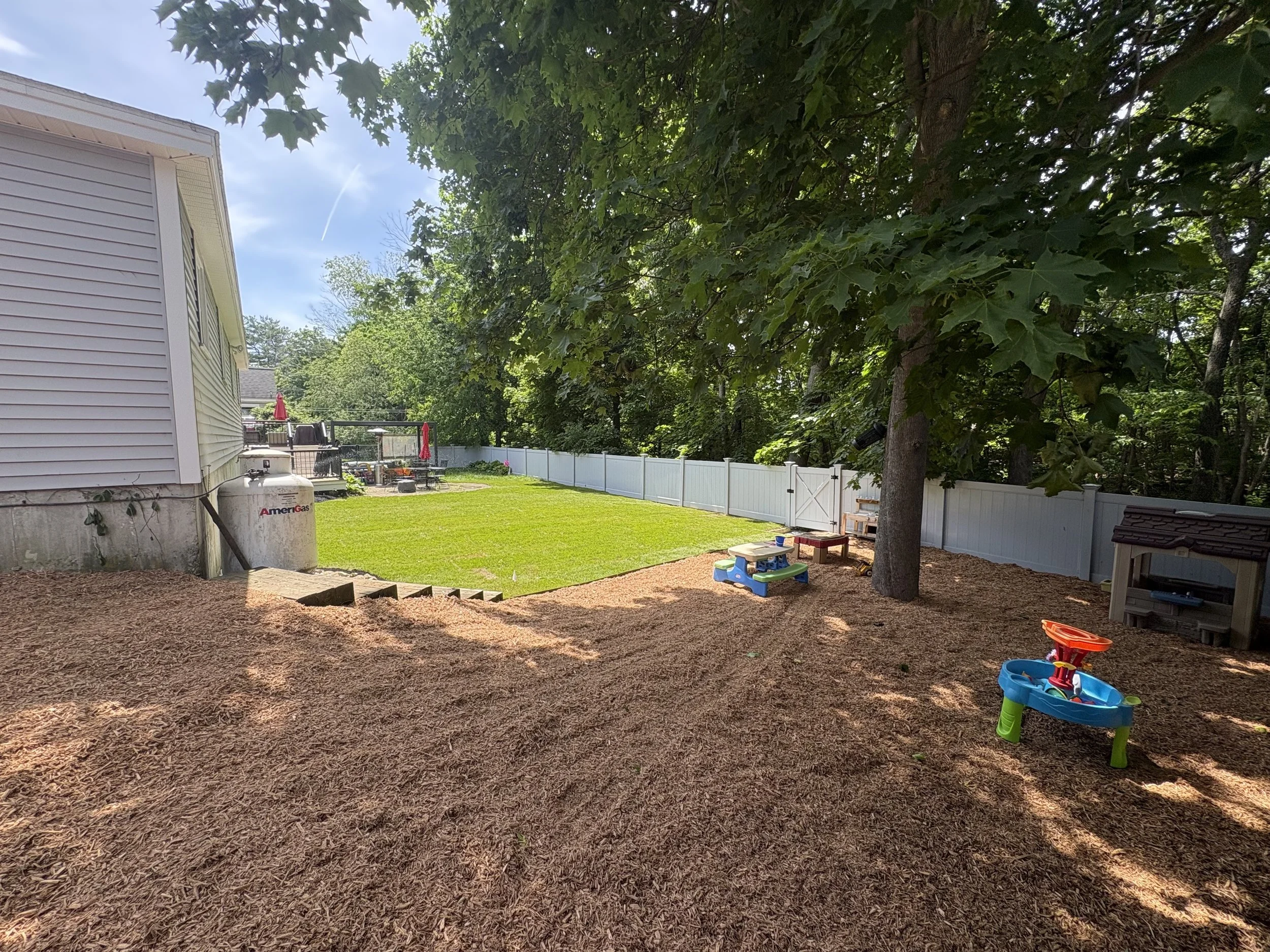 New playground mulch installed to create a safe outdoor play area.