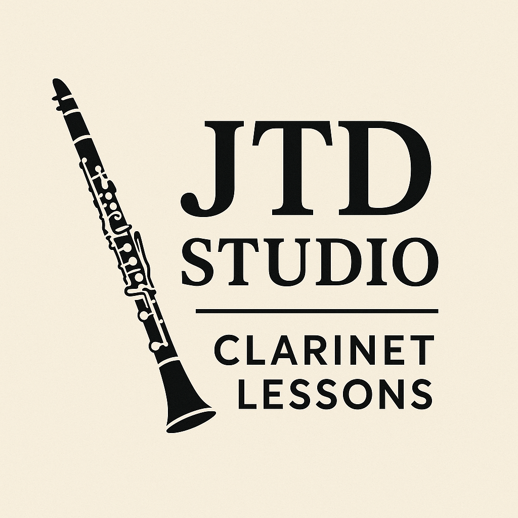 Logo for JTD Studio Clarinet Lessons featuring a silhouette of a clarinet and text.
