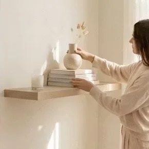 Stylist installing furnitures and decoratives