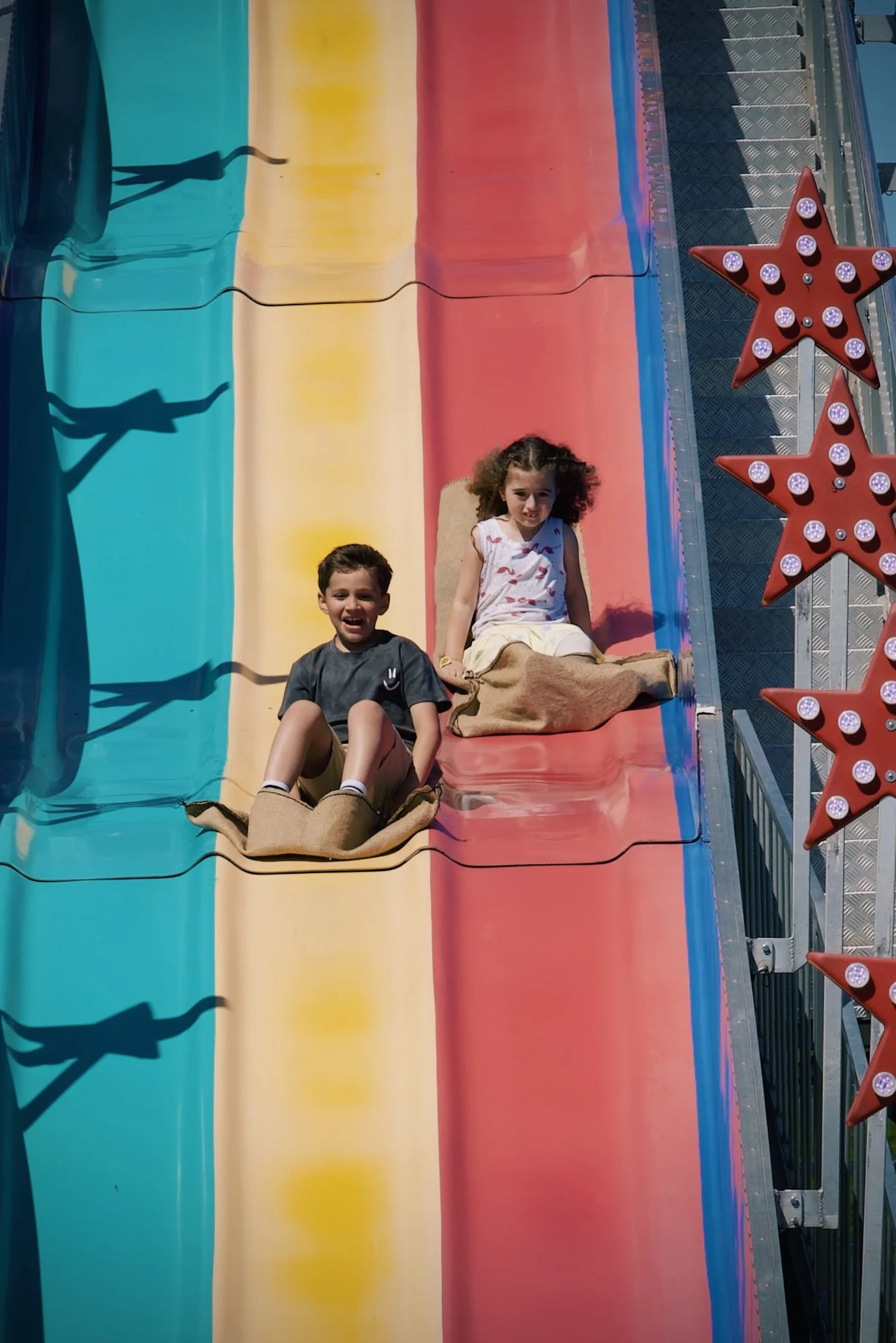 Kids slide at the Woodenshoe Tulip Festival in Woodburn, Oregon