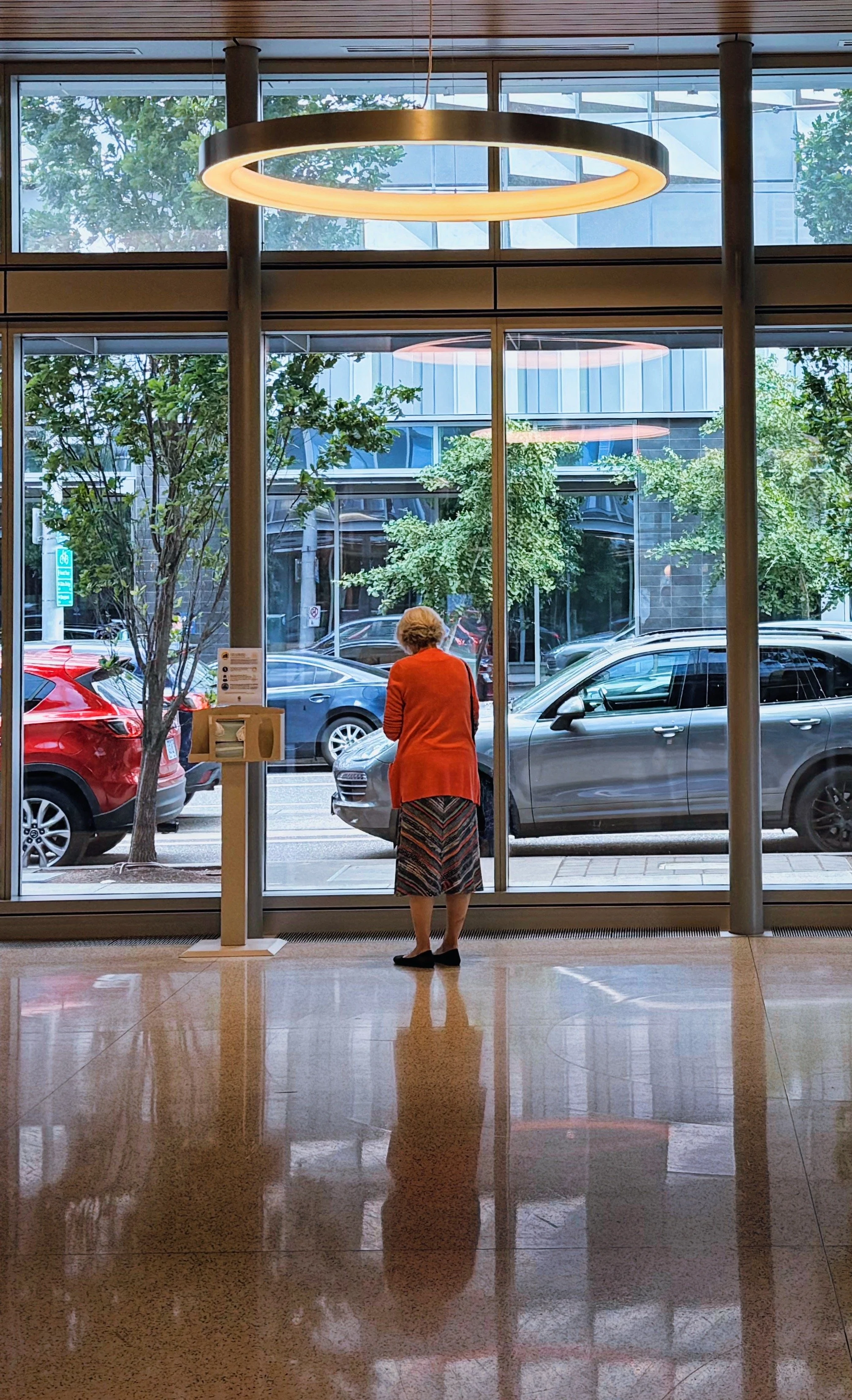 iPhone shot of a woman in the lobby at OHSU - Portland, Oregon