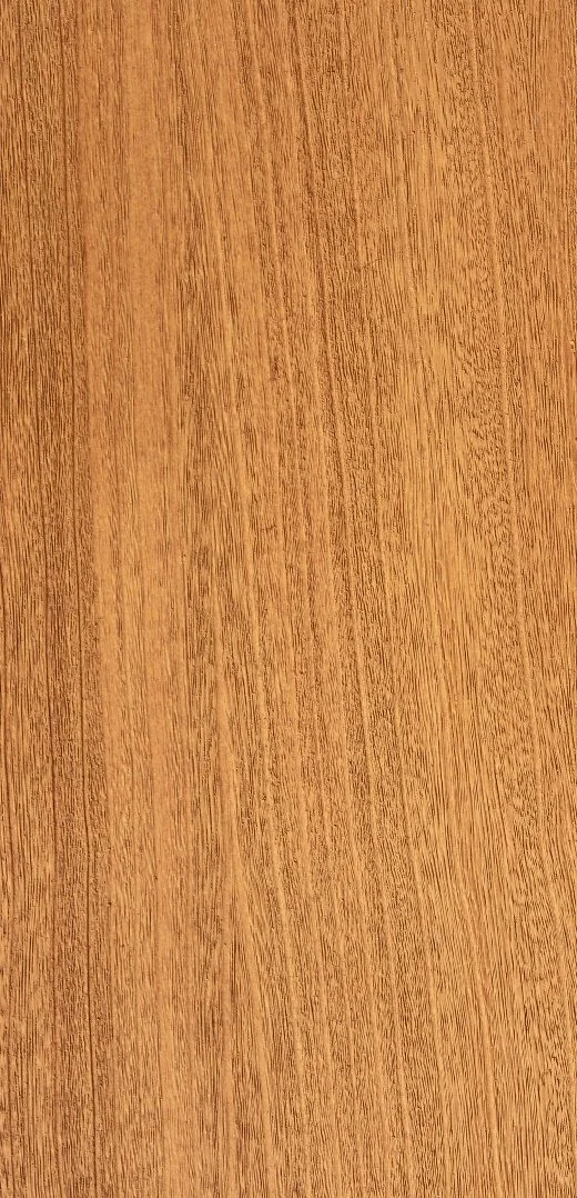 Close-up image of a wooden surface with a natural grain pattern.