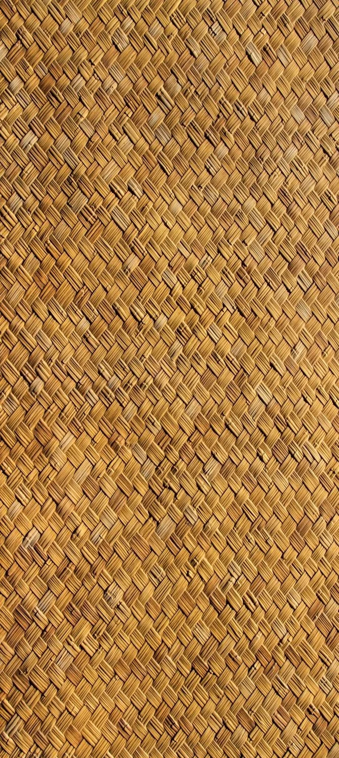 Close-up view of a woven straw or rattan pattern