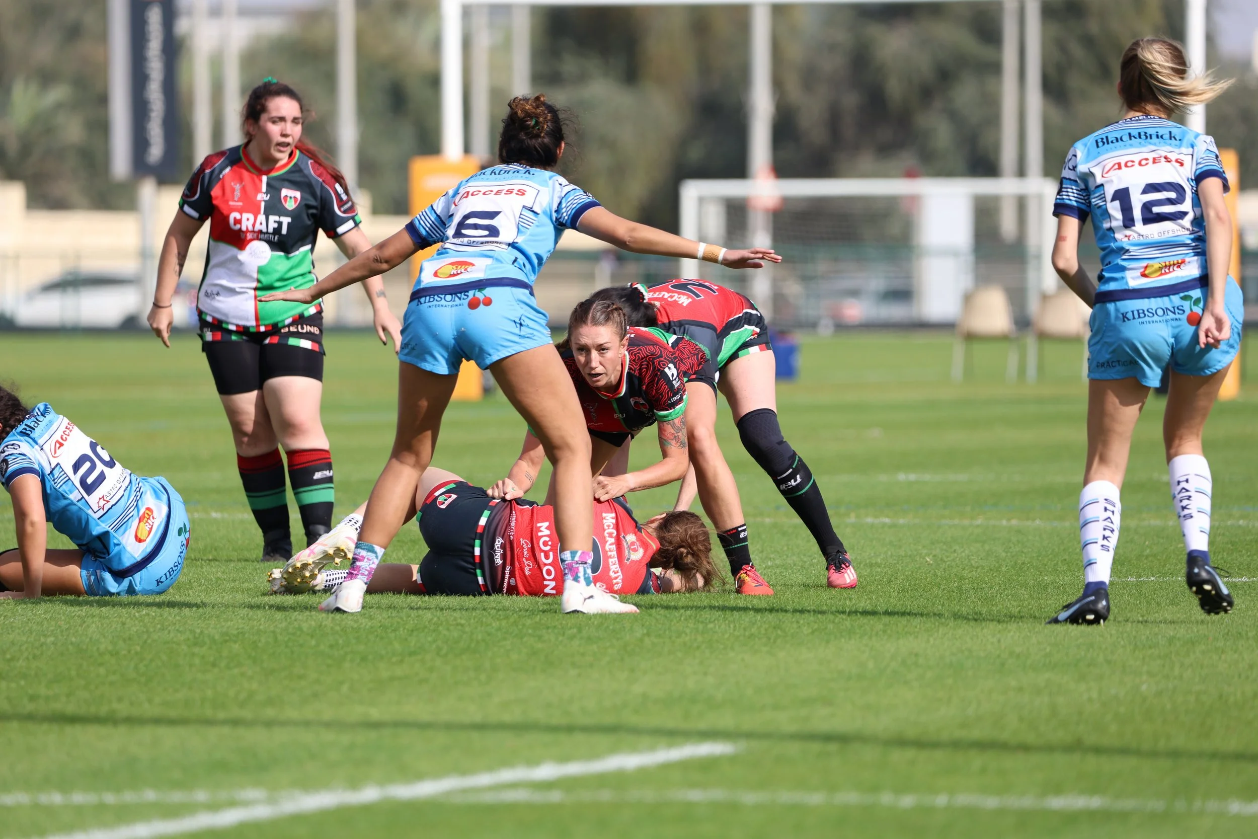 TJ Manson competing for the ball during a women's rugby match
