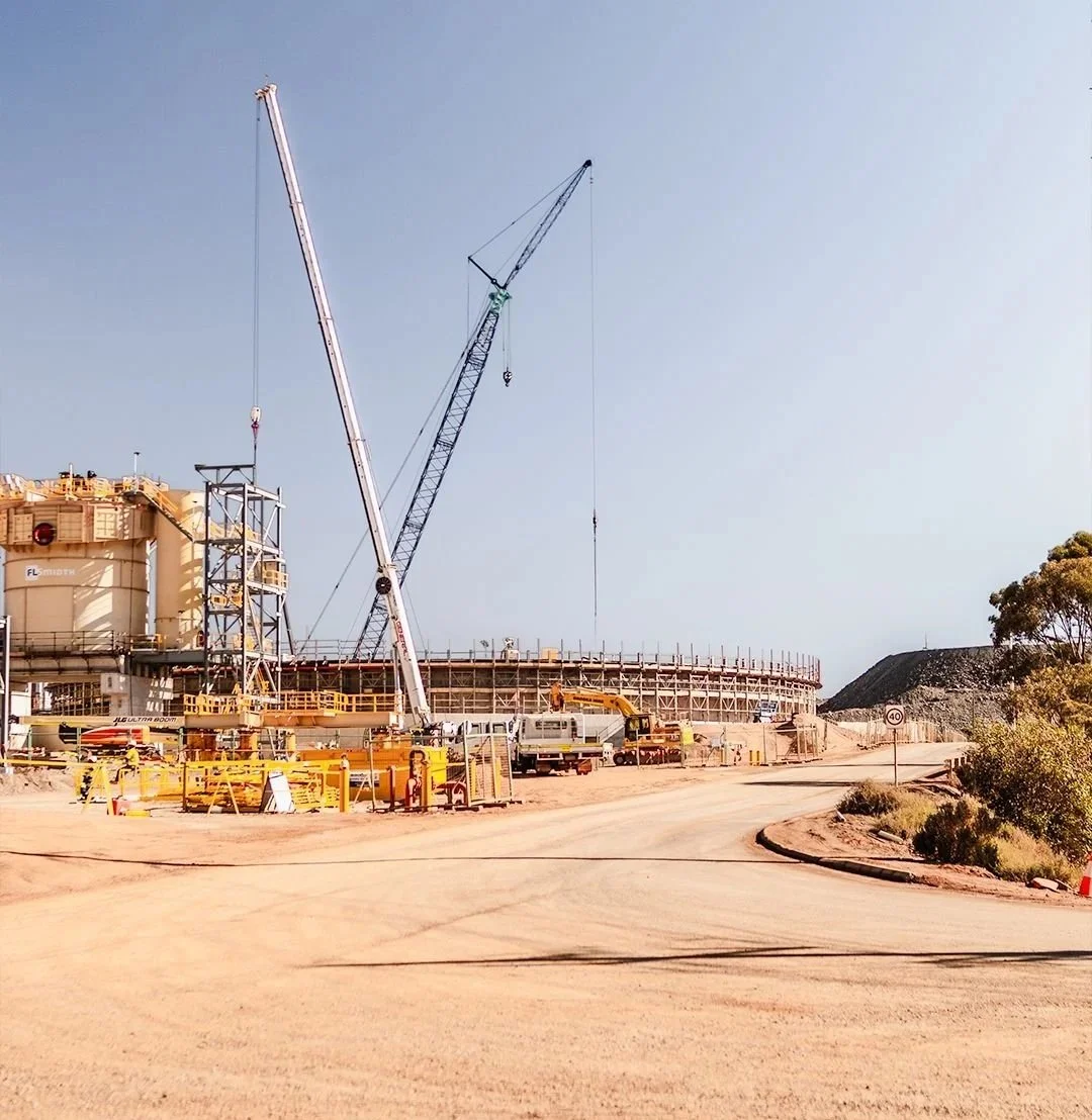 Large-scale mine site construction with crawler crane and lattice boom crane, processing plant expansion Western Australia