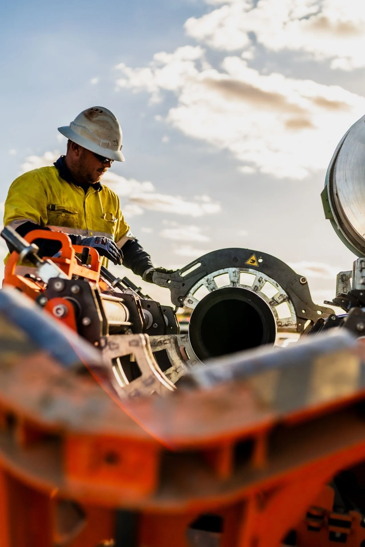 Civil contractor operating large diameter HDPE pipe fusion equipment on WA mining project