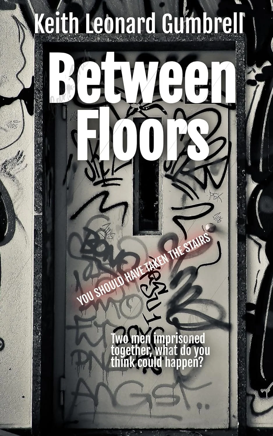 A graffiti-covered door with text that reads 'Between Floors' in large white letters, 'You should have taken the stairs' in smaller white letters with red underline, and a question 'Two men imprisoned together, what do you think could happen?' at the bottom.