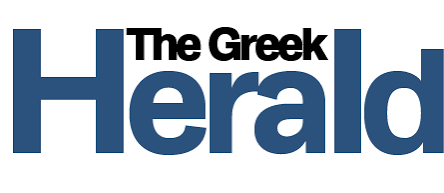 Logo of The Greek Herald in blue and black text.