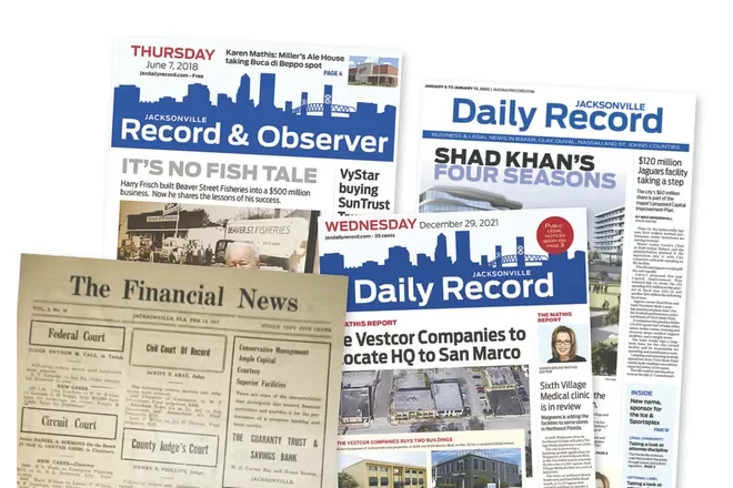 A collection of newspapers, including the Jacksonville Daily Record, Jacksonville Record & Observer, and The Financial News, scattered on a surface.