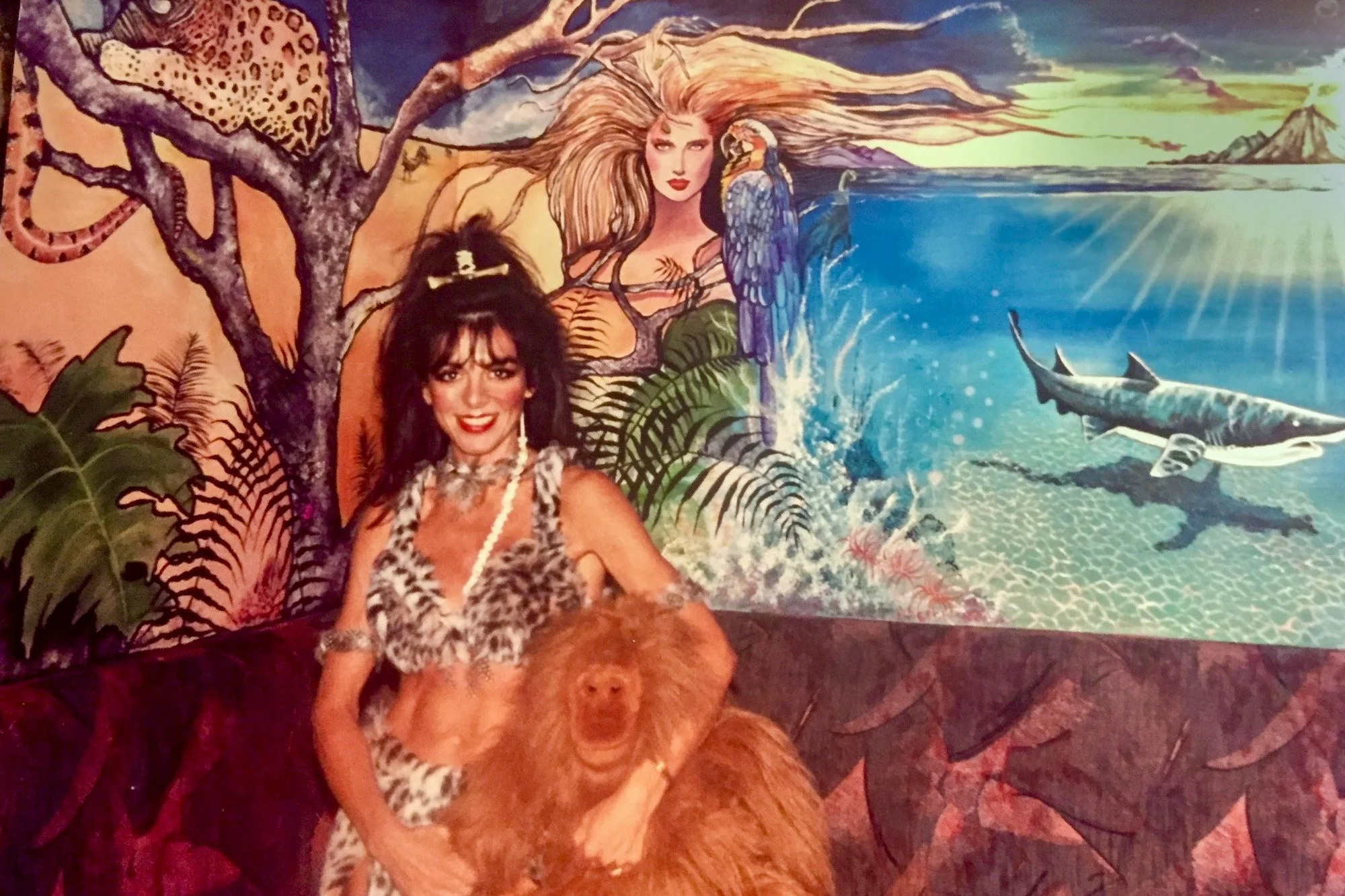 Fay Stassis Vernon in costume beside one of her early murals