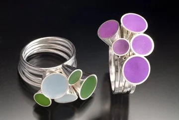 Jello shot stackers. Two sets of 5. Sterling silver nesting rings, (right all purple set, left green and light blue set).