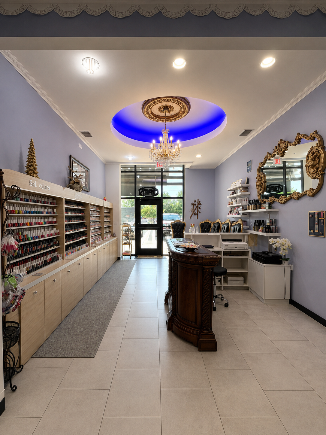 Nail salon interior with gel nail polish displays, nail station with chairs, decorative mirror, chandelier, and a glass door leading outside.