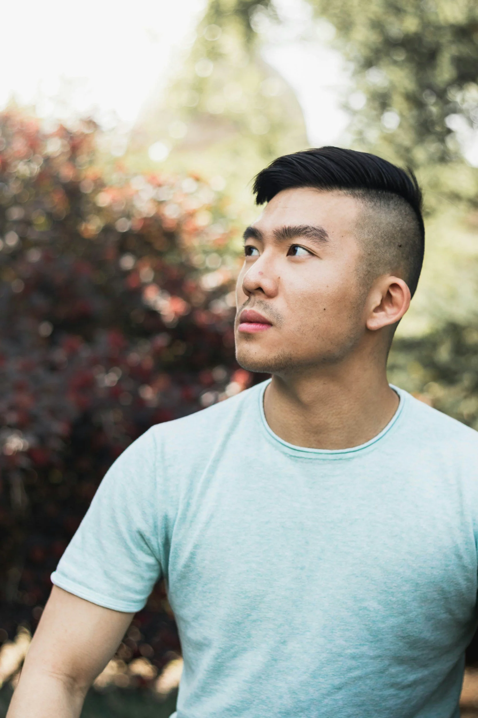 a photo of a man looking off into the distance
