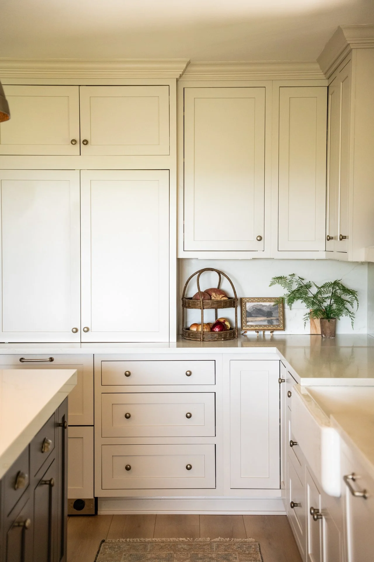 Luxury mountain home kitchen with concealed storage and polished nickel fixtures