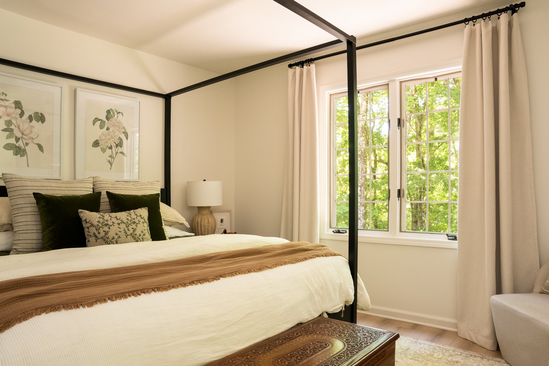Forest green bedroom in Highlands NC mountain home with canopy bed