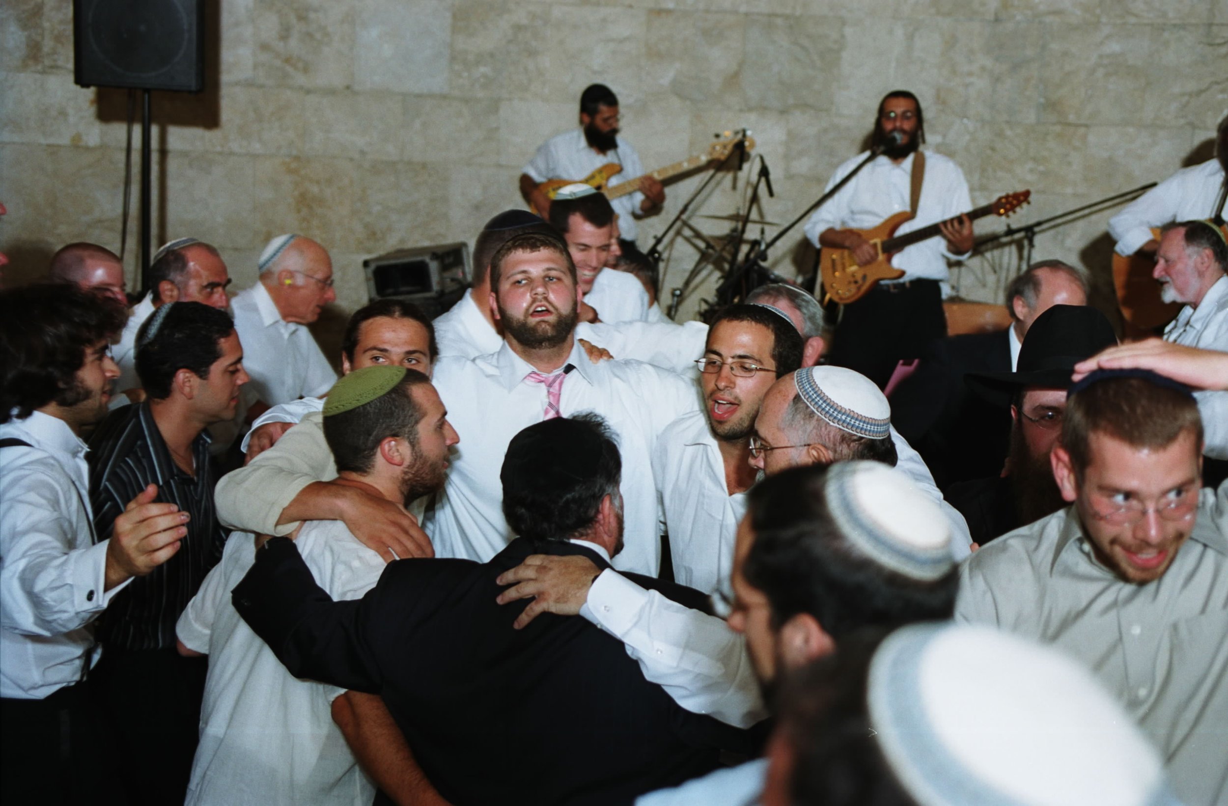 Man Dancing &amp; Group Singing 